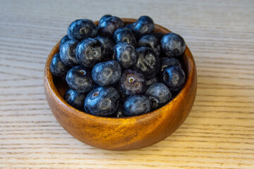 Fresh Blueberries in Wooden Bowl