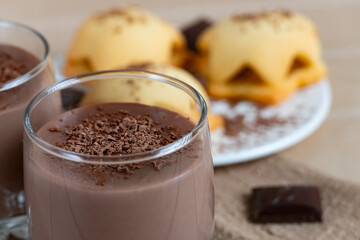 Homemade cookies with chocolate pudding and grated dark chocolate