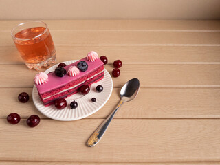 Elegant Dessert with Cherry and Blueberry Garnish