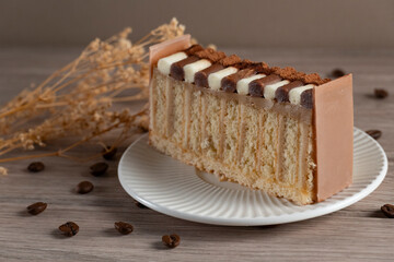 Elegant Coffee Cake Slice with Coffee Beans