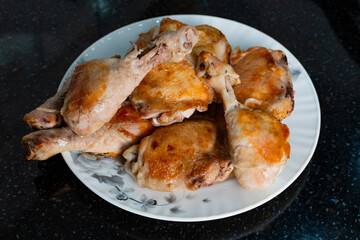 Roasted Chicken Drumsticks and Thighs on Floral Plate