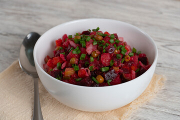 Traditional Russian beet salad vinaigrette in a bowl