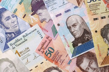 Venezuelan Bolivar currency money bills in big amount. Stack of VED currency banknotes with different denomination close up