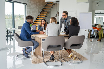 Diverse business team collaborating during office meeting