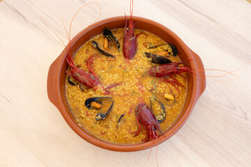 Traditional spanish rice dish with red prawns and mussels