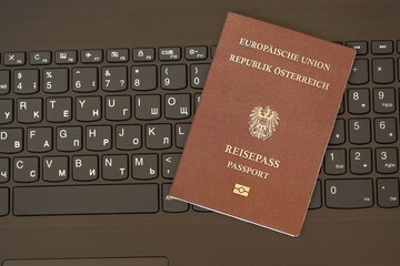 Austria Passport Lies Black Laptop