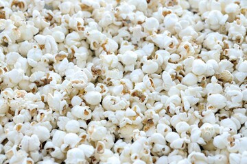 Homemade Salty Popcorn, top view. Flat lay overhead from above.