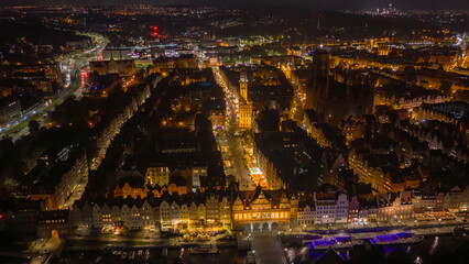Aerial night view of Gdansk Old Town along the Motlawa River