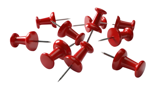 A cluster of bright red thumbtacks with sharp metal pins scattered against a dark black background