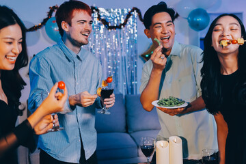 Diversity, dinner and group of people toast celebration together at party. Friends, happy and celebrate with food, wine and friendship for love, support and cheers champagne at business function