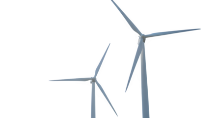 Two modern wind turbines stand tall against a dark black background showcasing renewable energy technology