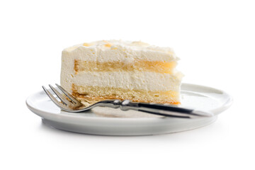 Sweet creamy cake on plate isolated on white background.
