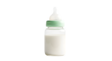 A clear glass baby bottle filled with white milk and a green cap and nipple isolated on a black background