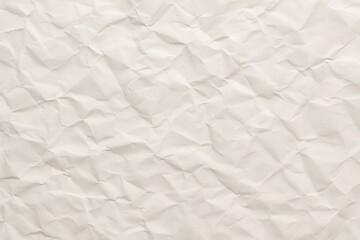 Obraz premium High resolution wrinkled white paper texture with soft creases and subtle shadows