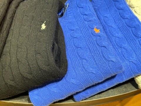 Warm unisex wool sweaters by Ralph Lauren in boutique