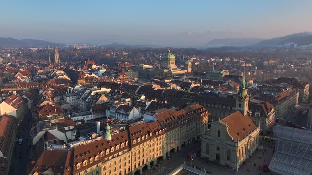 Bern Old Town, The Capital of Switzerland from above in Evening Sunset Light at Winter. Aerial Drone shot.