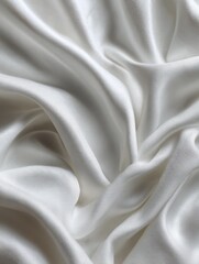 Obraz premium A close-up of white fabric with soft folds and wrinkles