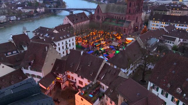 Basel Christmas Market Aerial Shot. Illuminated Basler Weihnachtsmarkt in the evening Twilights at Winter in Switzerland