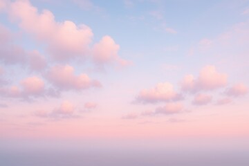 Obraz premium Dreamy sunrise sky with cotton candy clouds in pink and blue soft gradients