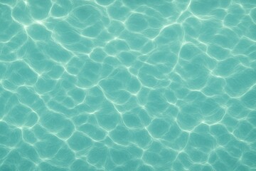 Fototapeta premium Crystal clear rippled water surface with sun caustics and gentle turquoise gradients