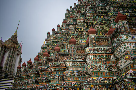 14.10.25 Bangkok, Thailand: Wat Arun Buddhist temple encrusted with colourful porcelain in Bangkok Thailand. West bank of the Chao Phraya River. 