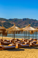 beach chairs and umbrellas on the beach
