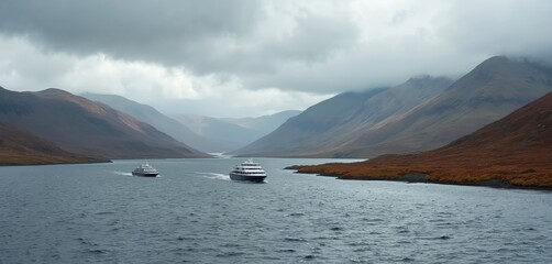 Two cruise ships sail on calm water between tall, sparsely vegetated mountains under a cloudy sky. One ship follows the other through a narrow sea channel.