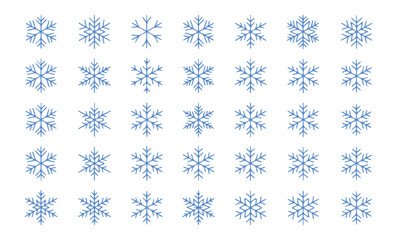 Delicate snowflakes in shades of blue shimmering with frosty elegance, perfect for winter holiday designs and creating a magical seasonal atmosphere