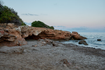 Rocky Mediterranean coast with green moss, Castellón, Spain