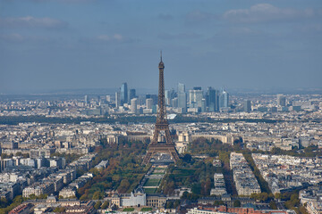 Panoramic view of Paris with the Eiffel Tower in the foreground and the La Defense district in the background from the Montparnasse Tower