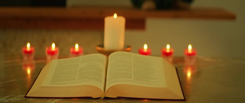 Open Bible on an altar with seven lit candles around it sacred moment in church