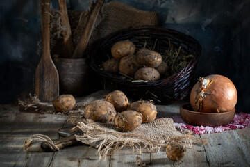 Fresh potatoes on a country table