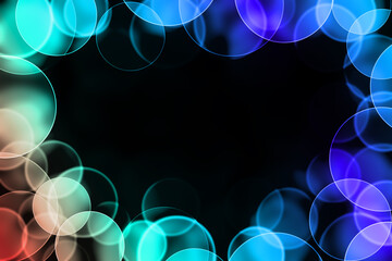 An abstract display shows colorful bokeh circles floating against a dark backdrop providing an eye...