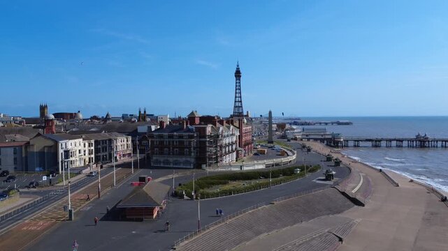 aerial view of Blackpool promenade showing the three piers Blackpool tower and town centre buildings