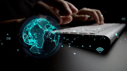 A close-up of hands typing on a keyboard emits a digital world map, symbolizing global connectivity and technological interaction in a modern cyber environment. Xenic