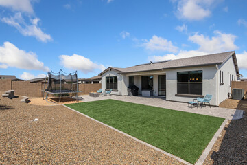 bright and inviting suburban property featuring modern amenities and calm backyard environment