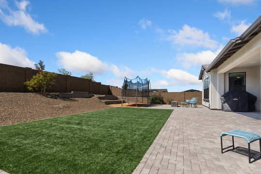 ideal spot for relaxation and gatherings, serene backyard space suited for leisure and social events