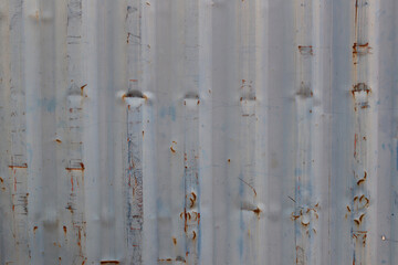 Surface of old zinc has traces of use background.