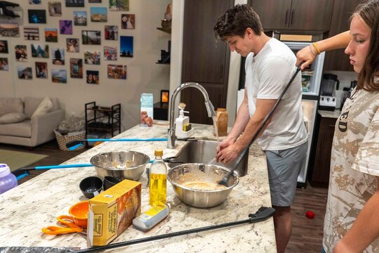 Cooking Together An Enjoyable and Warm Moment Shared in the Kitchen