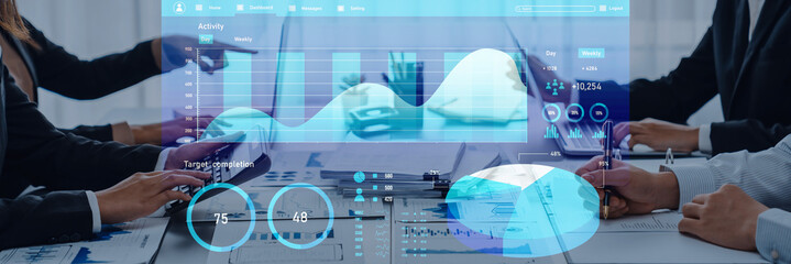 A dynamic corporate meeting showcasing advanced data visualization techniques, emphasizing teamwork, analysis, and insightful decision-making strategies across multiple screens. Axiom