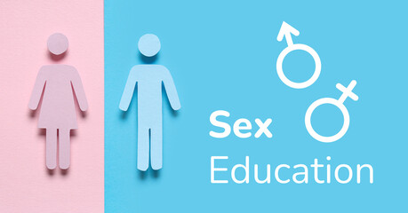 Male and female paper figures on color background