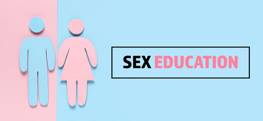 Male and female paper figures on color background