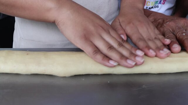 Close Up of Baker Hands Kneading Dough for Homemade Artisan Bread