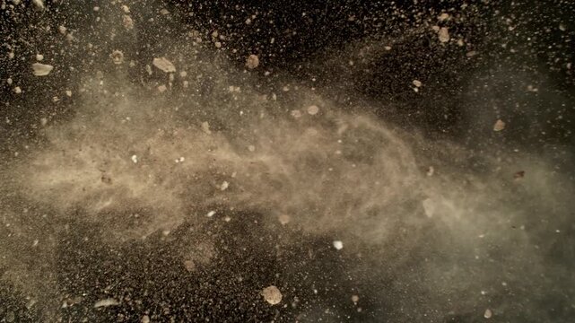 Super Slow Motion Shot of Exploding Soil with Rocks at 1000fps.