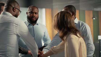 Multiethnic staff proud of their successful teamwork collaboration, clapping hands after business analysis. Employees use data visualization and forecasting for project objectives. Camera B. - Powered by Adobe