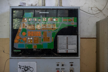 Abandoned distillery tower in Italy – circular industrial building with glass dome, steel beams, panoramic windows, decaying factory interior, urban exploration, post-industrial architecture
