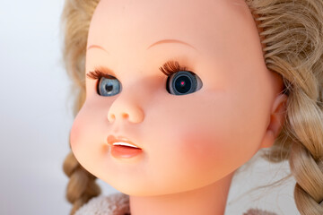 Miniature hidden surveillance camera embedded in doll's eye for covert monitoring purposes,...