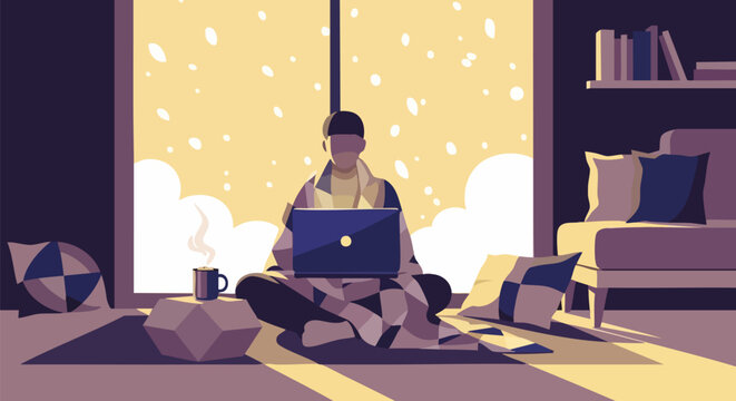 Person working on laptop in cozy room during winter with snow falling outside window