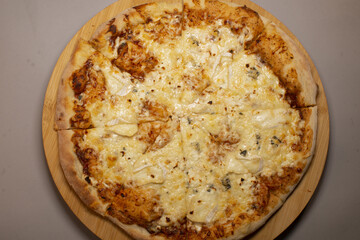 Italian pizza in close up, showing detailed toppings and texture, reflecting Mediterranean cuisine