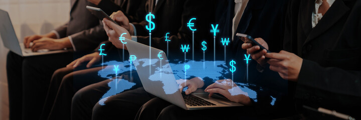 Business professionals engaged in currency transactions during a conference, showcasing technology, collaboration, and global communication through digital devices. Trope